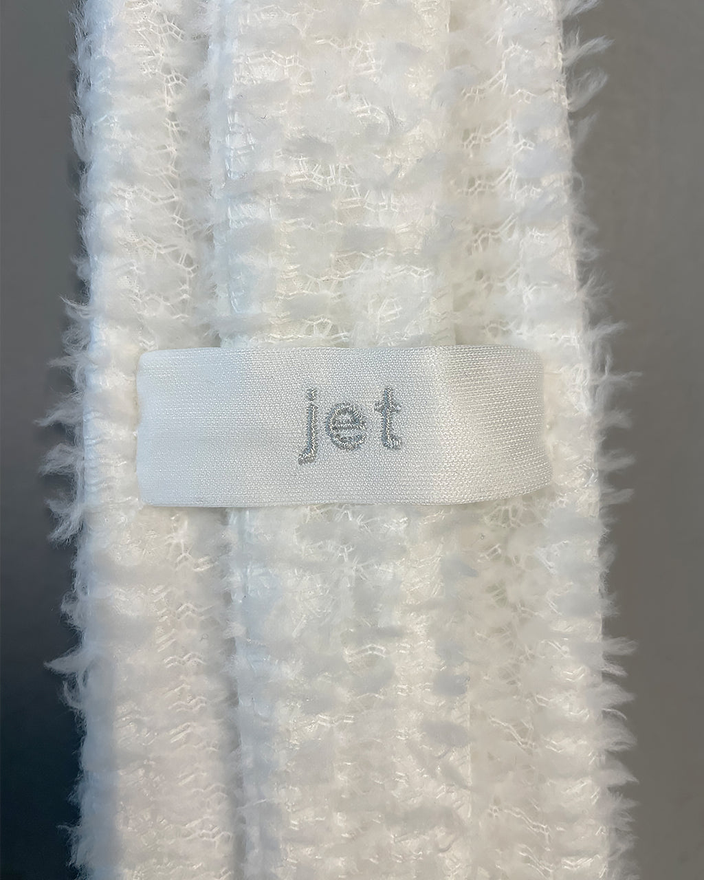 Tie Hood